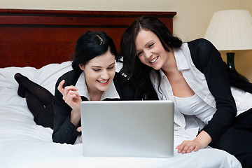 Image showing Female Executives Working on Laptop