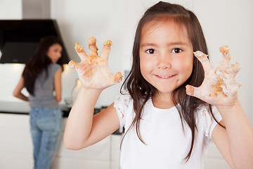 Image showing Child with Cookie Dough on Hands
