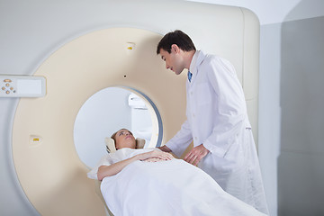 Image showing Young woman receiving CT scan