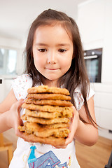 Image showing Young Girl with Homemade Cookies