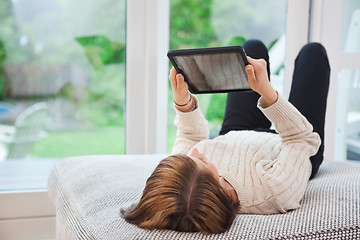 Image showing Woman holding tablet pc