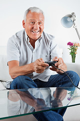 Image showing Senior Man Playing Video Game