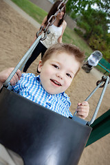 Image showing Portrait of Small Boy Swinging