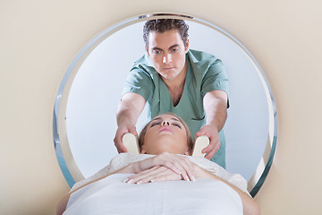 Image showing Young woman going through CT test