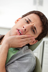 Image showing Young man with a toothache