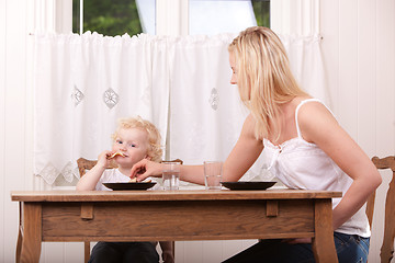 Image showing Mother and Son Eating Lunch