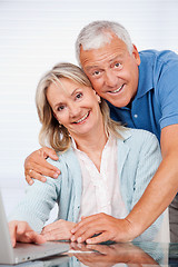 Image showing Happy Couple Using Laptop