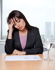 Image showing Business Woman Sitting at her Desk