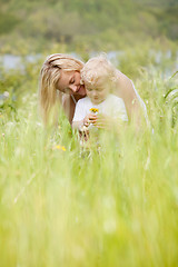 Image showing Mother and Son in Green Meadow