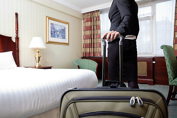 Image showing Woman in Hotel Room