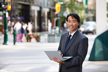 Image showing Business Man Portrait Outdoor with Laptop