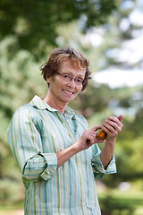 Image showing Senior Woman Writing Text message