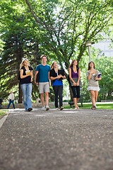 Image showing Happy Students Walking on Campus