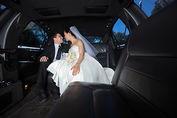 Image showing Wedding Couple in Limo