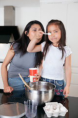 Image showing Mother and daughter in kitchen