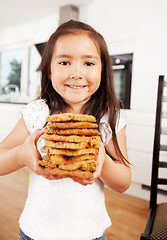 Image showing Cute Girl with Fresh Cookies