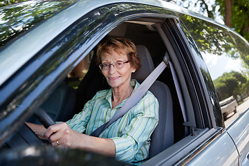 Image showing Senior woman driving car