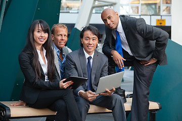 Image showing Business people using electronic gadgets