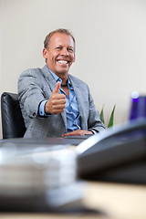 Image showing Businessman with thumbs up gesture