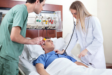 Image showing Doctor checking young patient