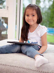 Image showing Cute Young Child with Digital Tablet