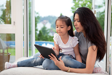 Image showing Mother and daughter with digital tablet