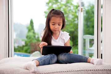 Image showing Young Girl with Digital Tablet