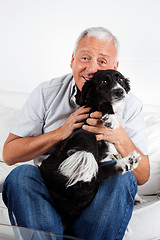 Image showing Happy Senior Man With His Dog