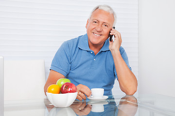 Image showing Senior Man Talking on Cell Phone