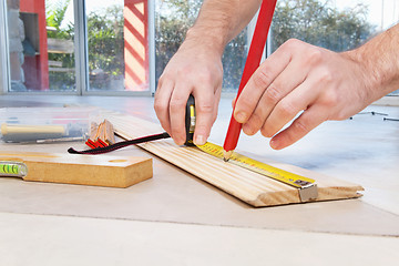 Image showing Engineer marking on plywood