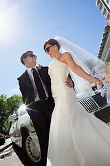 Image showing Happy Wedding Couple with Limo