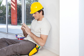 Image showing Construction worker with phone