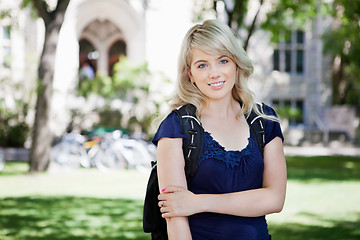 Image showing Young girl standing in the campus