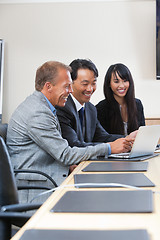 Image showing Cheerful business people at work