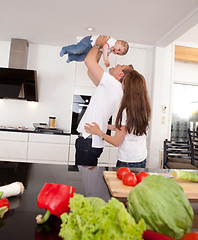 Image showing Playful Family in Kitchen