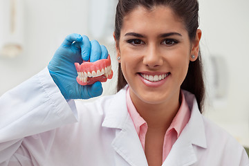 Image showing Dentist holding dental mold