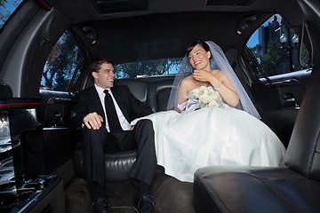 Image showing Newly wed couple in limousine