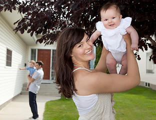 Image showing Mother and Daughter with House