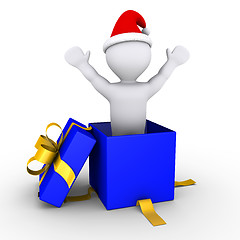 Image showing Boy coming out of a present