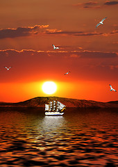 Image showing Sailing vessel against the coming sun