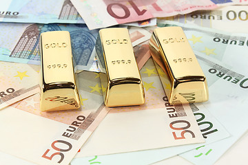 Image showing Gold bars and Euro