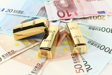 Image showing Gold bars and Euro