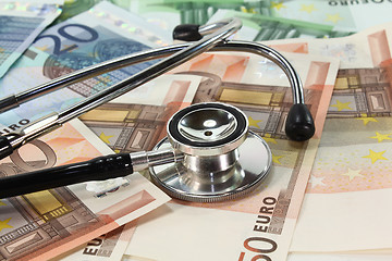 Image showing Stethoscope and Money