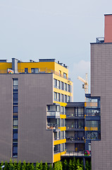 Image showing Newly build modern houses. Crane. Construction.