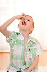 Image showing child with orange