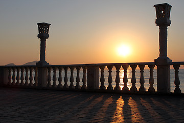 Image showing sunrise over quay