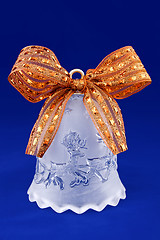 Image showing Glass Christmas bell with ribbon and reindeer