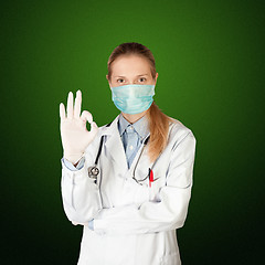 Image showing doctor woman with electrocardiogram