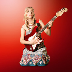 Image showing hippie girl with the guitar