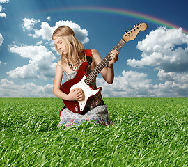 Image showing hippie girl with the guitar outdoor